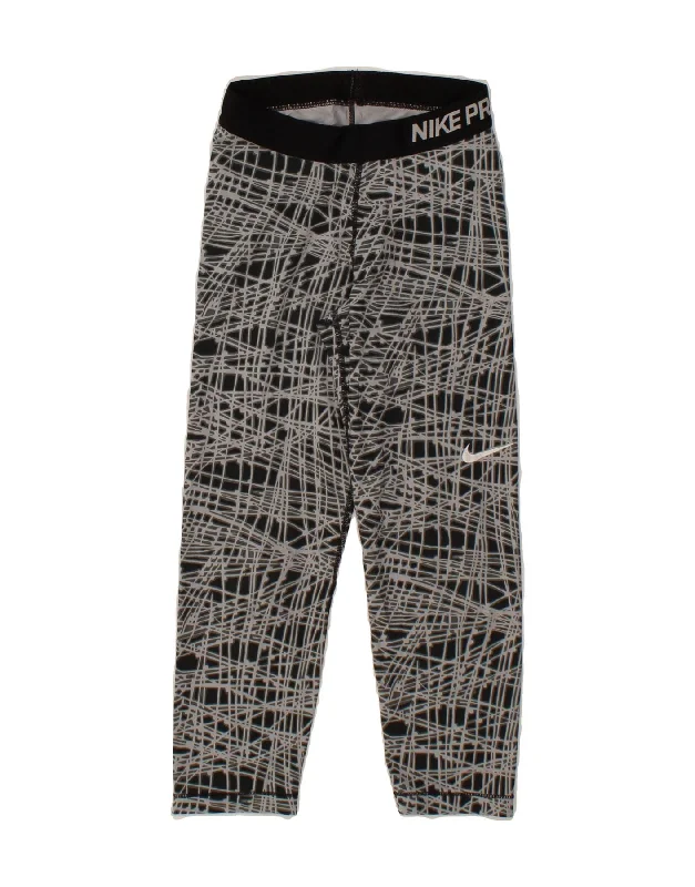 Soft Wearables NIKE Womens Abstract Pattern Tracksuit Trousers UK 4 XS Black